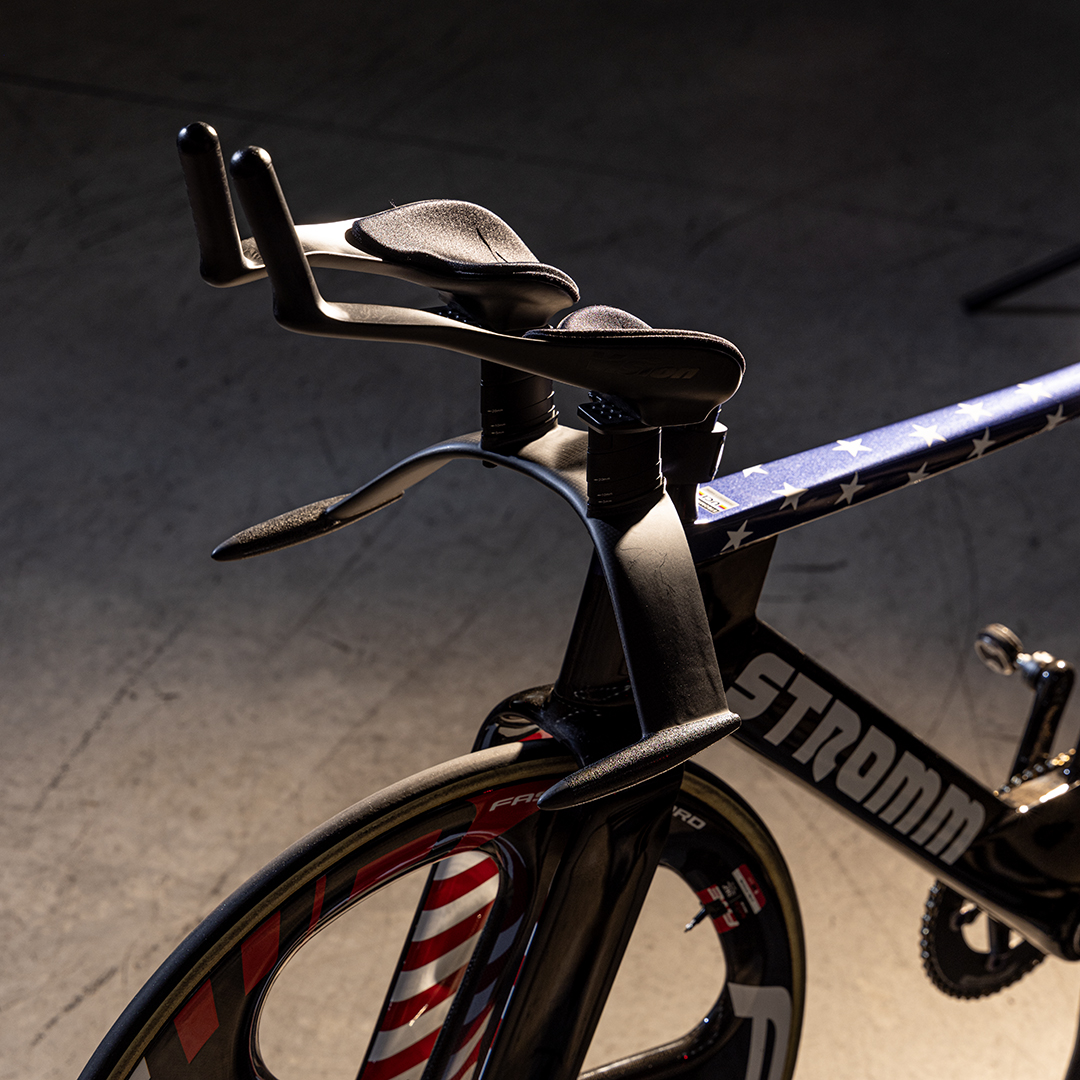 Stromm track bike aerodynamic handlebars featuring aerobar extensions.